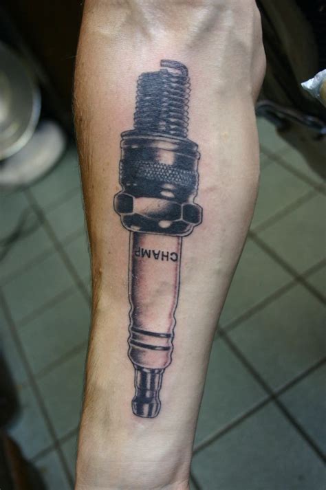 Spark Up Your Style with Striking Spark Plug Tattoos